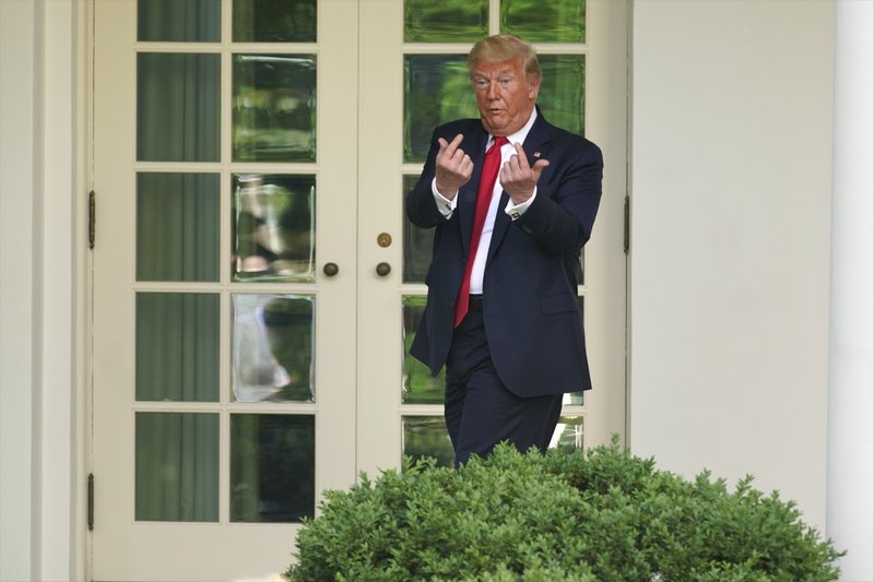 President Trump signs an order aimed at curbing protections for social media giants